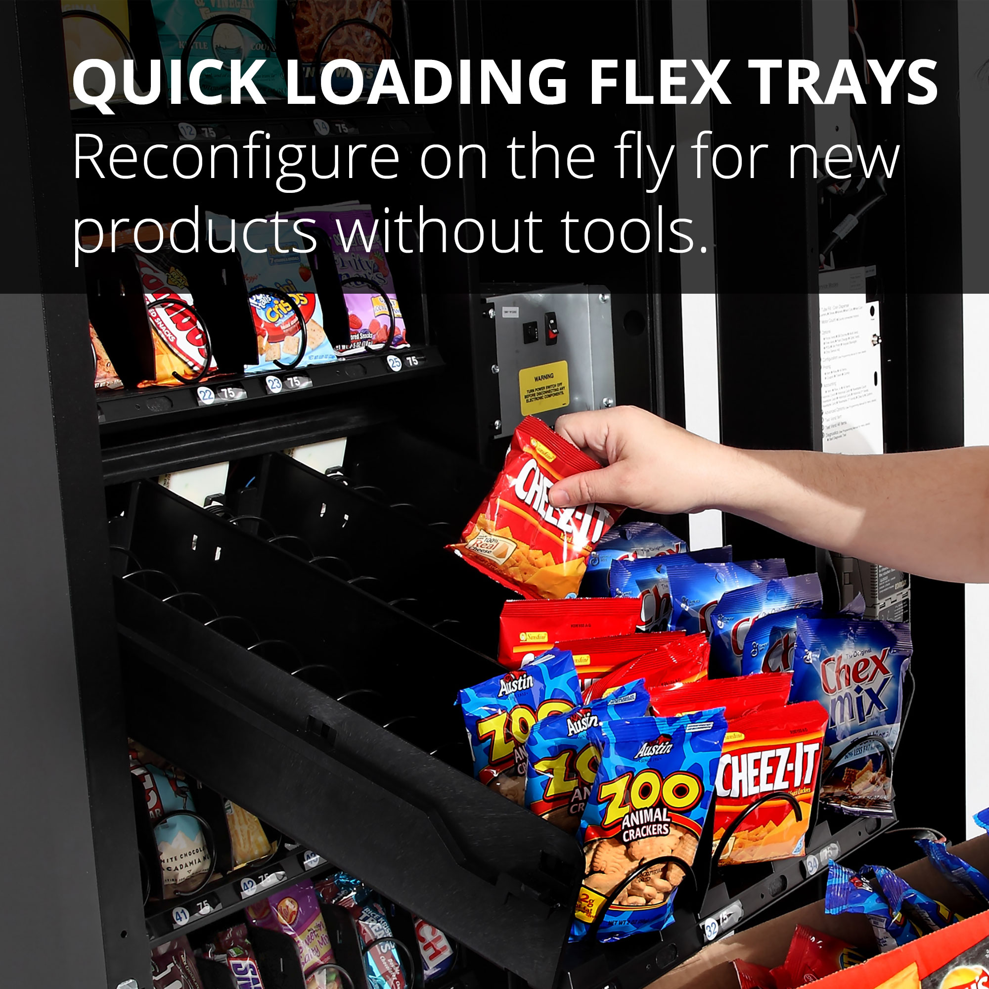 A vending operator filling snacks into configurable flex trays that can be reconfigured without tools.