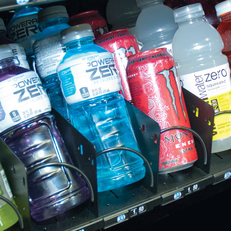 Beverage vending machine filled with Powerade, Monster Energy Drinks and Vitamin Water.