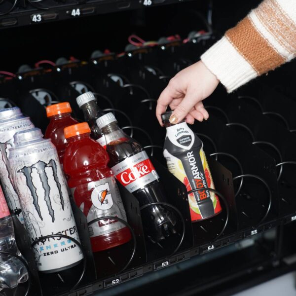 Loading drink in the drink vending machine in the coils